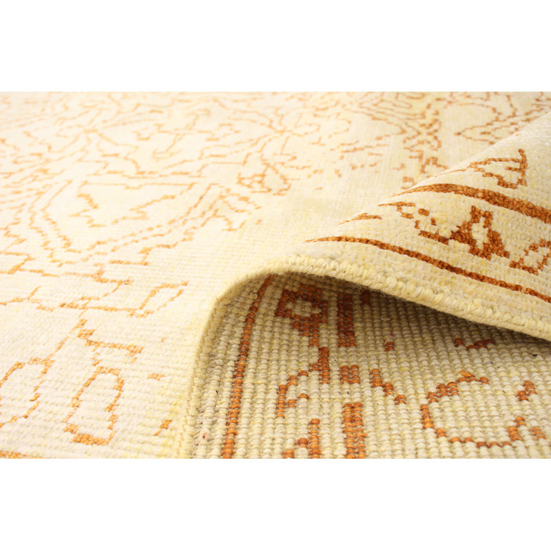Tapis oriental doré / ivoire noué à la main