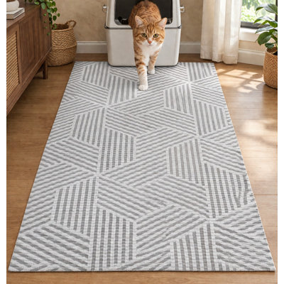 Beige Geo 40 x 25 in jumbo foam litter box mat with extra-large coverage, a paw-soft surface, trimmable construction, BPA-free foam, leak-proof protection, and machine-washable care.