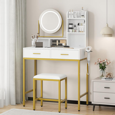 Ensemble de meuble-lavabo doré avec miroir rotatif et trois tiroirs réglables en bois clair avec tabouret et deux tiroirs