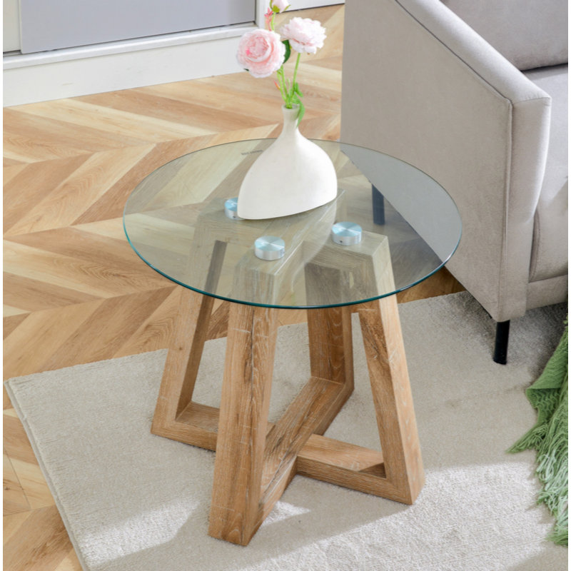 Table ronde moderne et pratique. Fabriqué en verre trempé transparent et de couleur bois