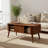 39.37" Wide Modern Oval Coffee Table with Tapered Legs & Slatted Storage Compartment
