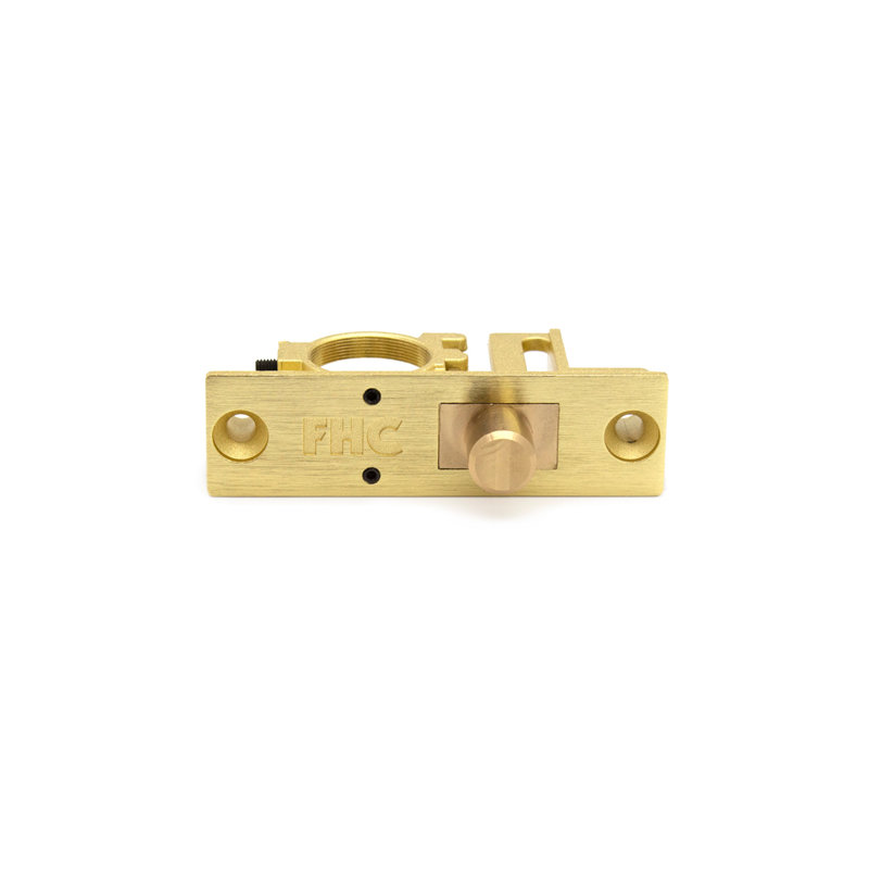 Verrou de sol discret FHC R777SLP pour rail de porte, avec vis de fixation, en laiton, diamètre des boulons : 5/8 po, finition laiton.