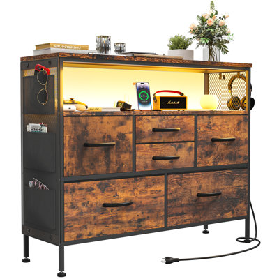 Dresser For Bedroom TV Stand With Power Outlets And LED Light, 6 Drawers Dresser With Side Pockets & Hooks, Wide Dresser With Shelves For 45" TV, Fabr by Ivy Bronx