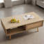 Table basse rectangulaire en rotin avec rangement à porte coulissante, finition aux tons naturels, largeur de 41,34 pouces