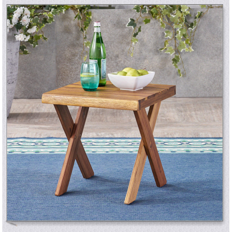 Table d'appoint en bois d'acacia fabriquée à la main avec finition en teck sablé pour une utilisation extérieure et charme rustique