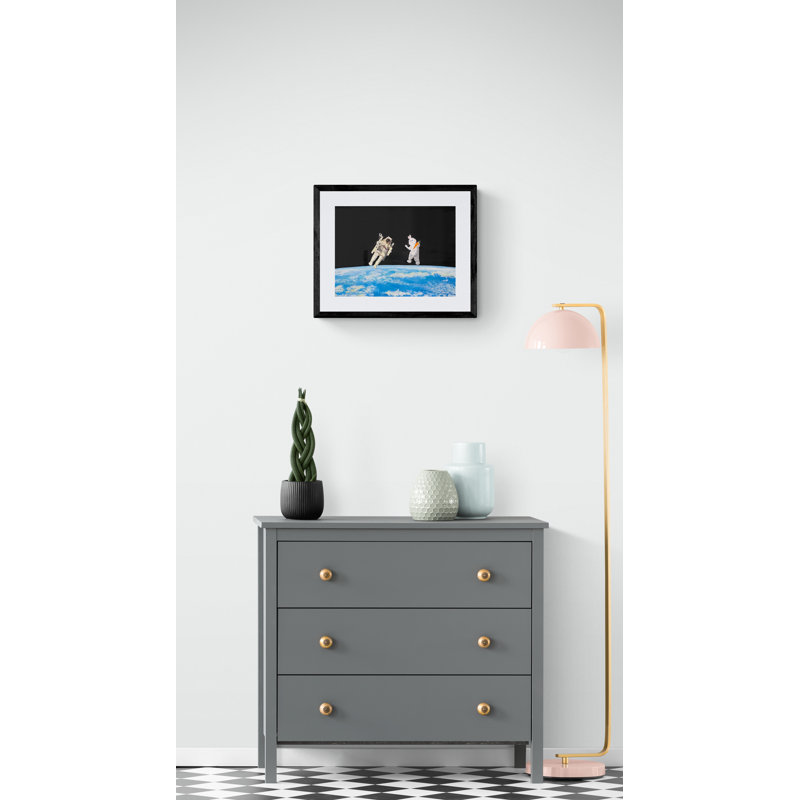 The Astronaut And The Easter Bunny: A Space Odyssey Print by Tom Blood, 17.25" H x 21.25" W