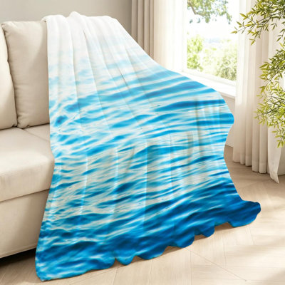 Jeté en flanelle transparente molletonnée ultra douce, imprimé d'un côté bleu océan de mer