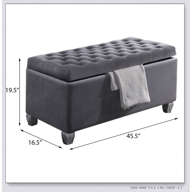 Banc de rangement gris capitonné