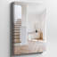 Toile, une scène d'intérieur minimaliste mettant en vedette un escalier moderne avec des marches d'art en bois menant vers le haut illuminées par un doux art mural sur toile-13926647