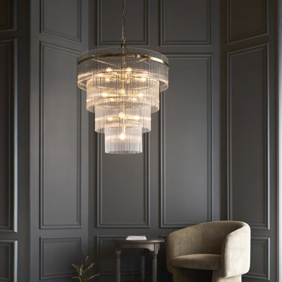 Geira 16lt Tiered Pendant light finished in Ant. Brass