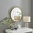 Rowden layered metal frame round mirror with a modern statement design