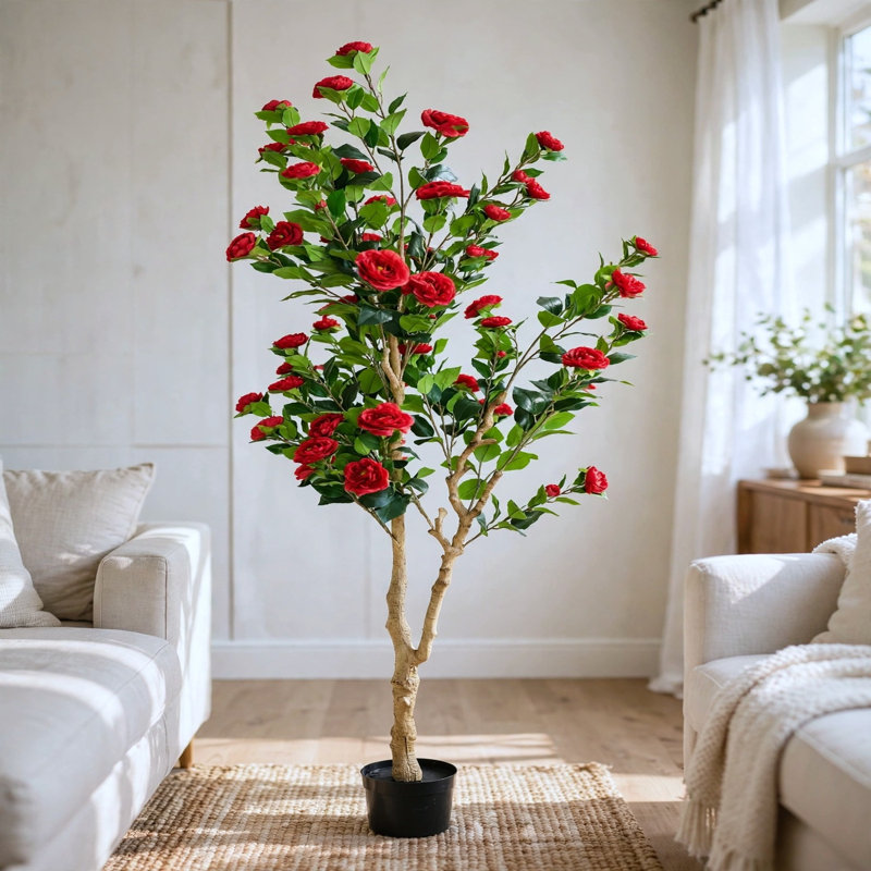 Camélia artificiel de 7 pi avec fleurs rouges dans un pot noir