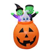 The Holiday Aisle® Pumpkin Basket with Baby Ghost, Witch and Monster ...
