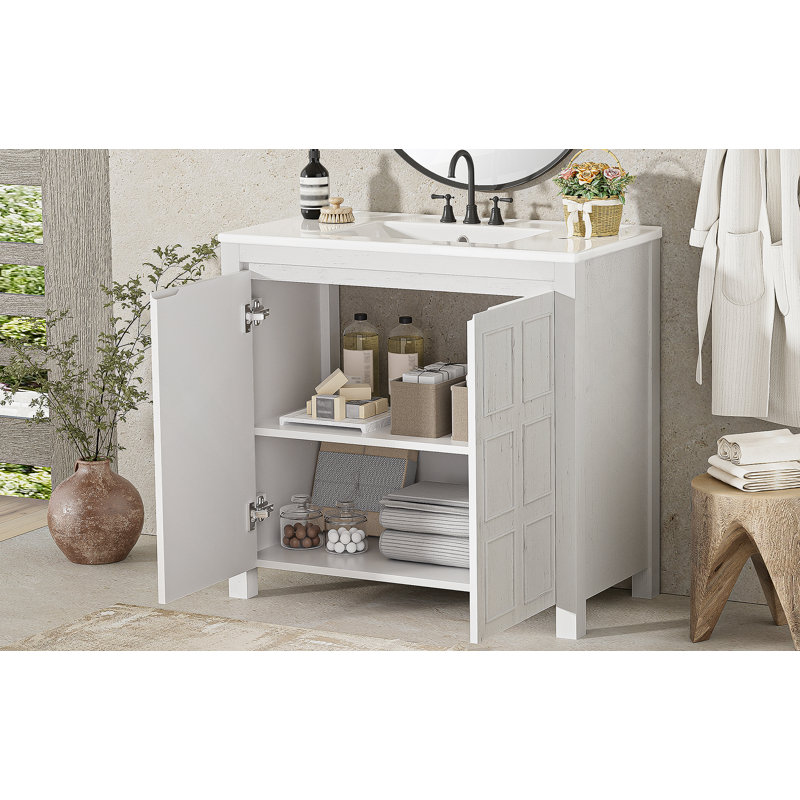 Organisateur de meuble-lavabo fabriqué à la main avec lavabo en céramique et beaucoup de rangement, idéal pour créer un espace de salle de bain fonctionnel et invitant.