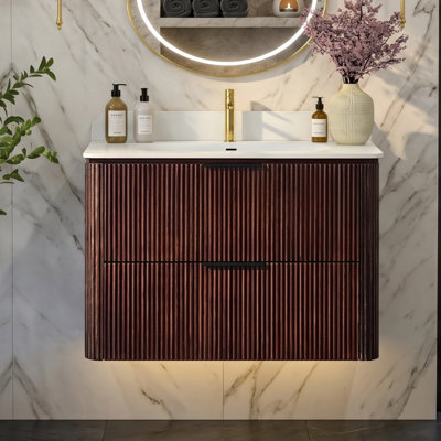 Meuble-lavabo suspendu de 76 cm (30 po) en fini noyer avec lavabo monobloc sans joint.