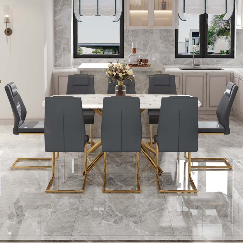 Janinda 8 - Person Glass Top Cross Legs Dining Set