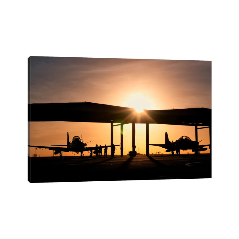 Two Embraer A-29 Super Tucano Aircraft Parked in the Hangar 1 Piece Wrapped Canvas Wall Art, 20.32 cm H x 30.48 cm W