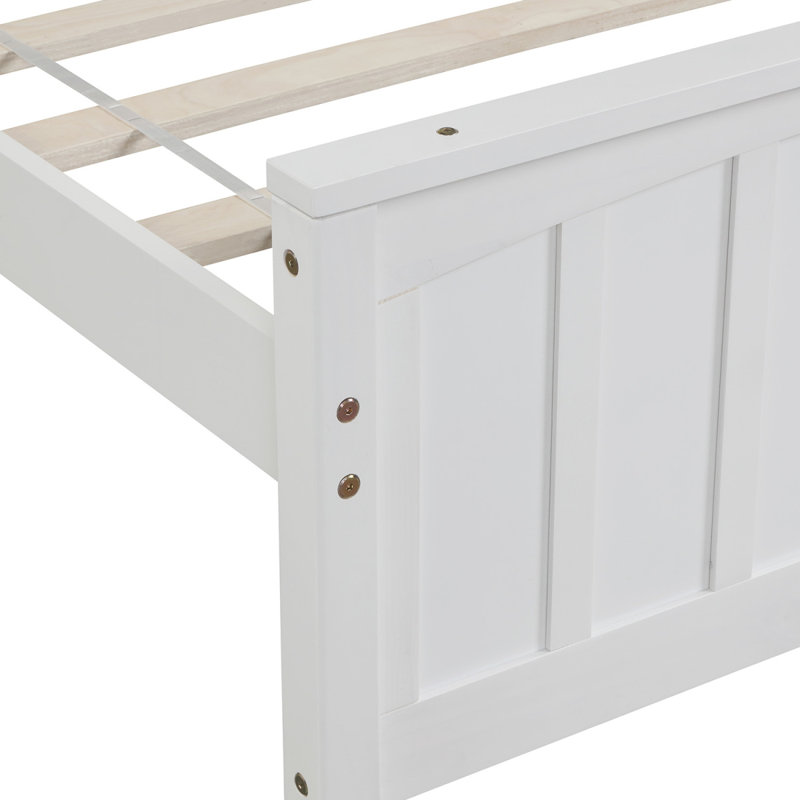 Lit plateforme simple en bois avec tête et pied de lit sans sommier