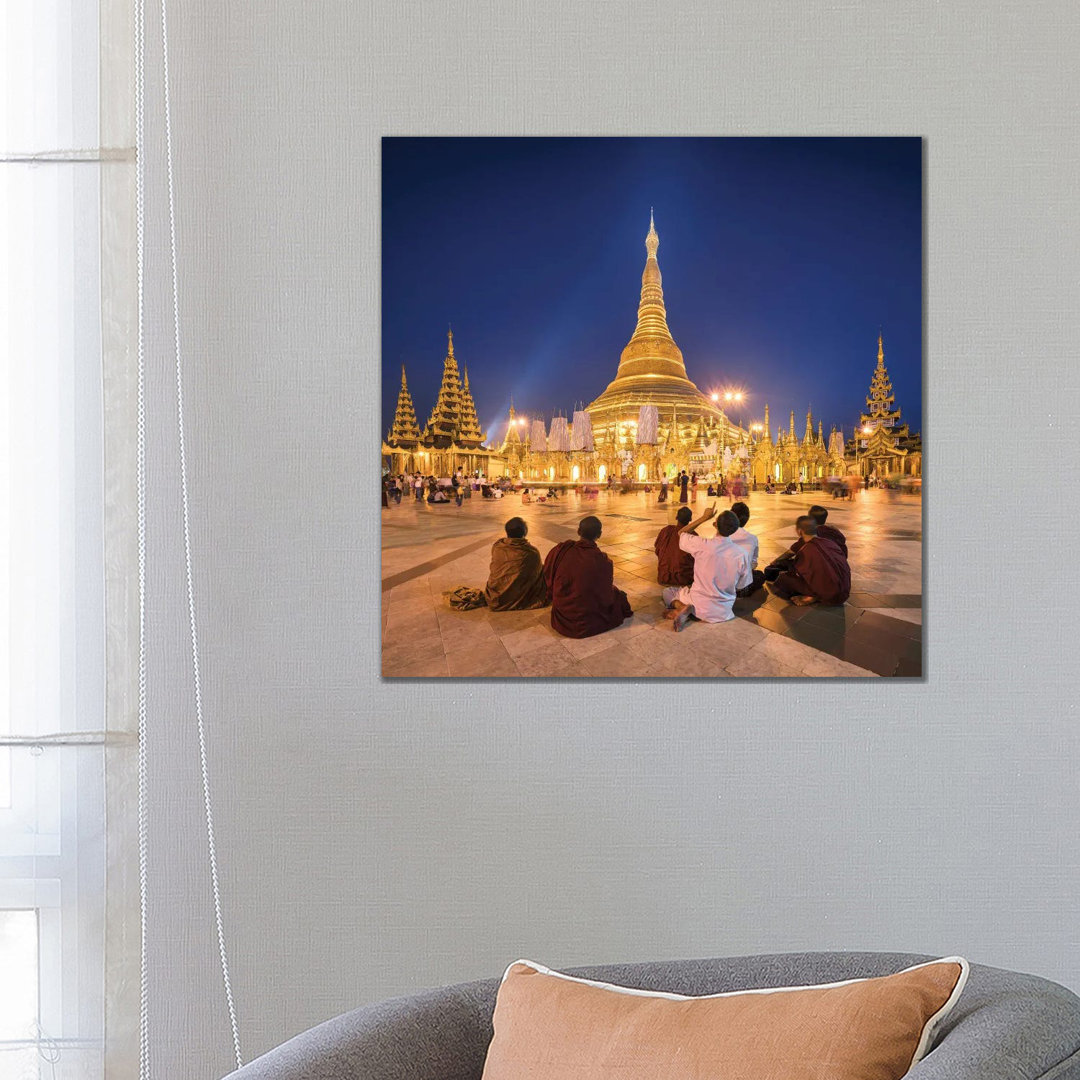 Group Of Buddhist Monks In Front Of The Golden Shwedagon Pagoda In Yangon, Myanmar by Jan Becke - Wrapped Canvas Print
