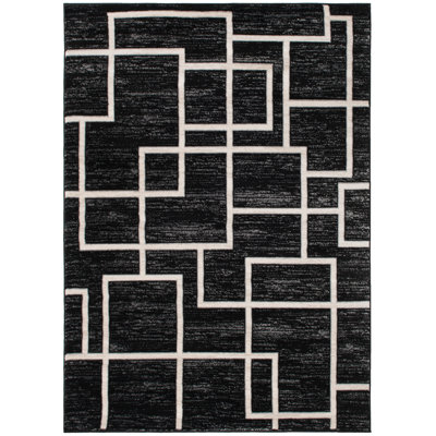 Finian Geometric Black Area Rug