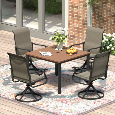 Ensemble repas pour 4 personnes avec table carrée en métal et chaises pivotantes PVC-coated polyester