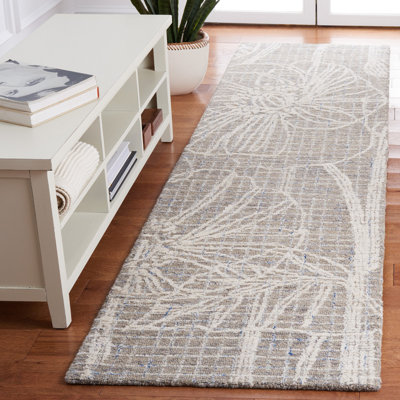 Hayan Hand Tufted Wool/Cotton Floral Rug in Beige/Ivory