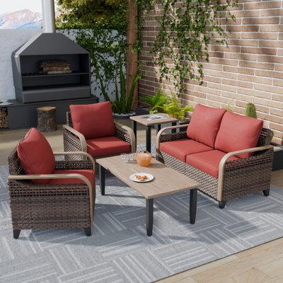 Mellon Wicker 4 - Person Patio Conversation Set with Cushions