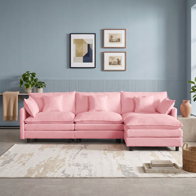 Canapé modulaire en L avec repose-pieds mobile