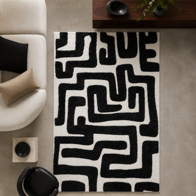 Tapis en polyester recyclé noir et ivoire Luna Meara