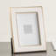 Cadre photo 5 x 7 en émail blanc avec bordure dorée électrolytique