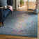 Felty Floral Blue Area Rug