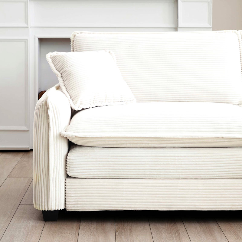 Velours côtelé beige profond, offrant une expérience d'assise luxueuse combinant confort et style pour votre maison