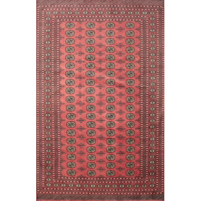 Tapis traditionnel rouge / rose / vert
