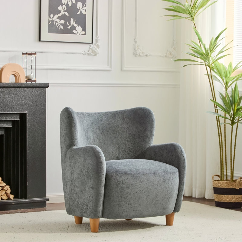 Fauteuil d'appoint incurvé rembourré à oreilles