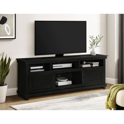 Meuble télé en pin élégant, 40,5 cm de large, quatre compartiments et deux espaces dissimulés pour ranger vos appareils multimédias. Compatible avec les téléviseurs à écran plat de 70 à 79 pouces. Six accessoires inclus.