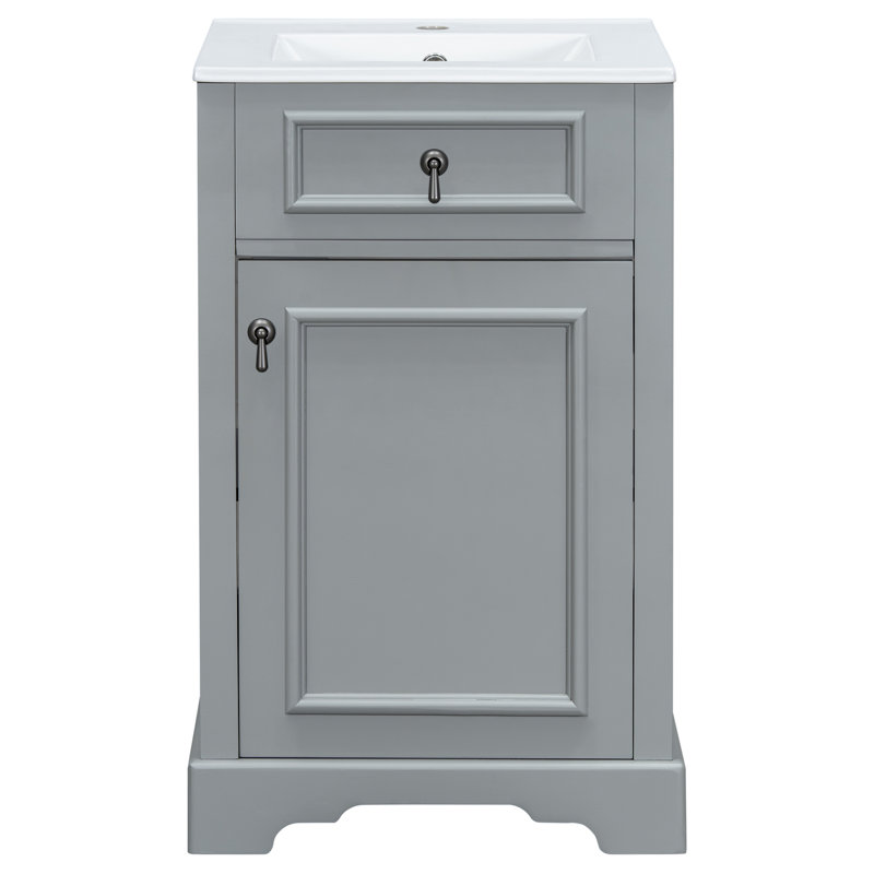 Meuble-lavabo de 20 pouces avec lavabo en céramique, porte à fermeture douce, tablette réglable et support de rangement fixé à la porte