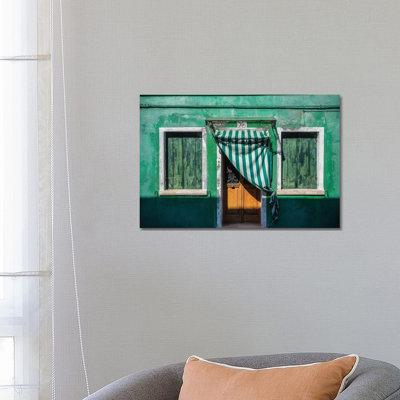 Italy, Burano. Weathered House Exterior. by Jaynes Gallery - Wrapped Canvas Print