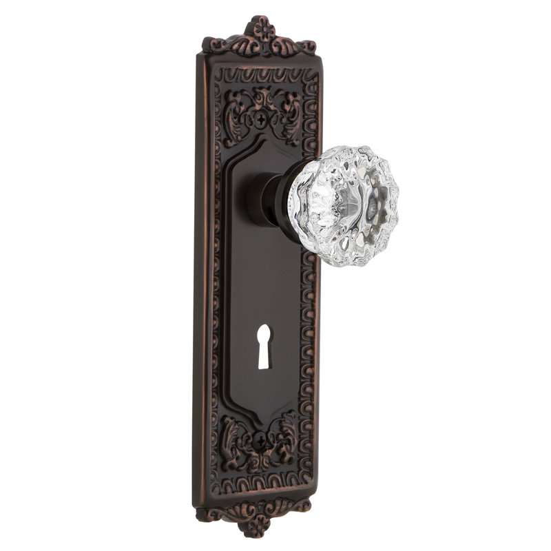 Egg & Dart Plate with Decorative Keyhole and Crystal Door Knob, Timeless Bronze, 2-3/4"