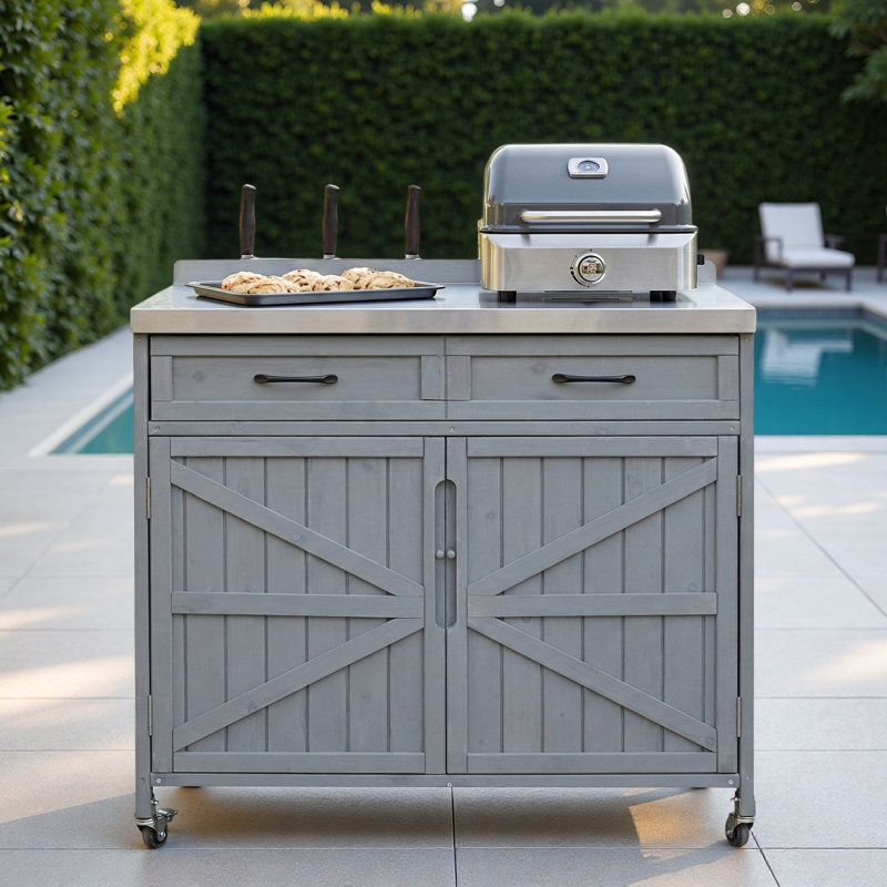 Îlot de cuisine extérieur avec plateau en acier inoxydable, grand tiroir, tablettes réglables, supports de rangement internes et 4 roulettes