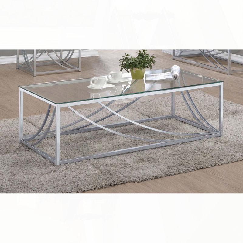 Table basse en verre et chrome avec pieds en métal élégants