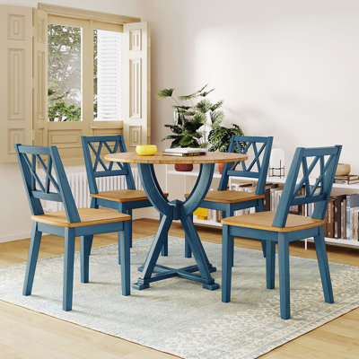 Sherando 4 - Person Pedestal Dining Set