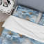 Literie à motif floral pétales bleus éthérés-557790318