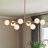 Jewellia 8-Light Metal Linear Sputnik Chandelier with Glass Shades -1493602984