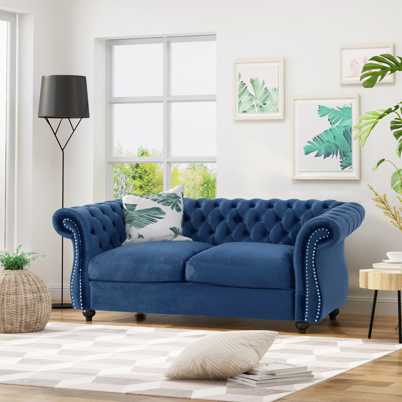 Élégant velours bleu marine avec accoudoirs à boutons