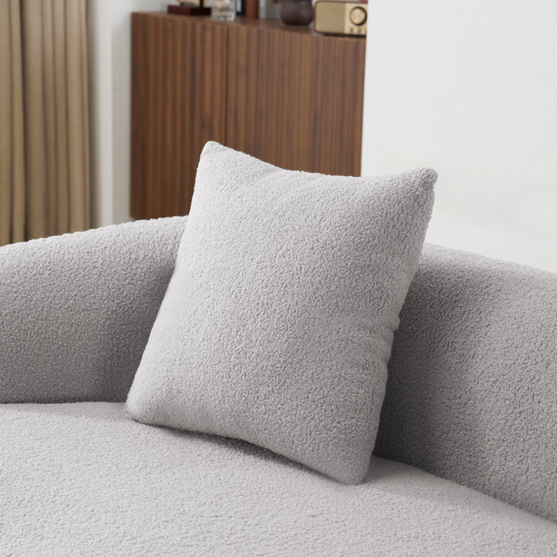 Canapé d'angle gris incurvé avec accoudoirs ronds, 2 places, compression, pour toutes les pièces, sans montage, entretien facile, soutien ergonomique, confort optimal, idéal pour le salon ou le bureau.