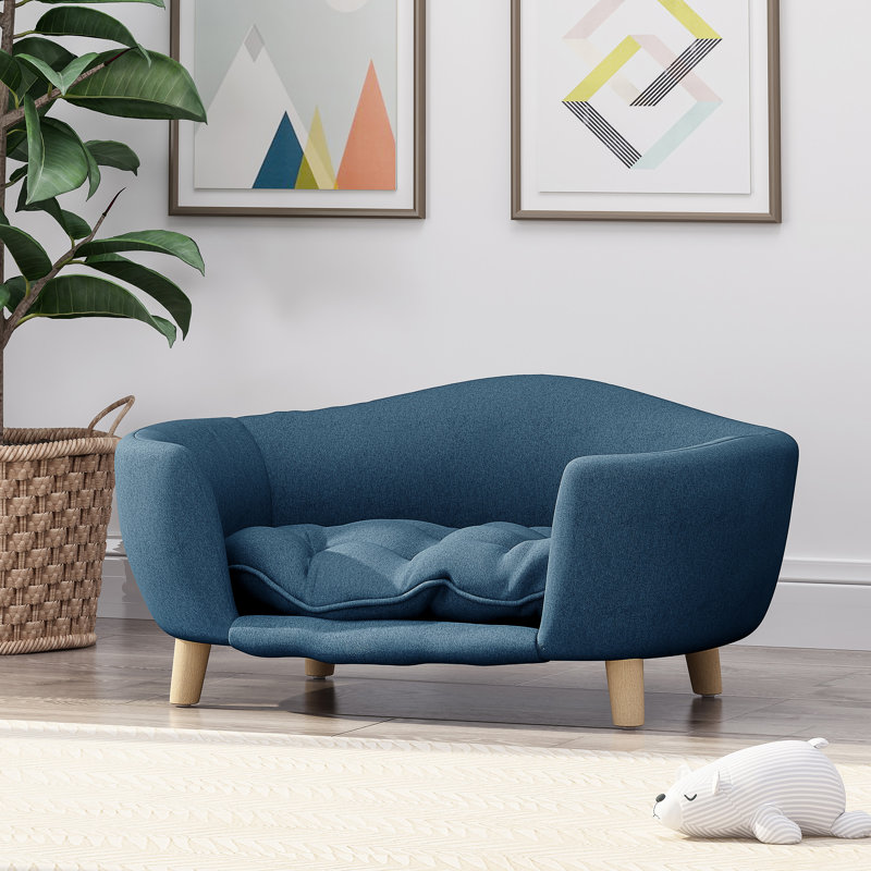Lit luxueux pour chien de style Mid-Century moderne avec pieds en bois de bouleau et coussin capitonné moelleux, idéal pour le confort et le style des petits chiens