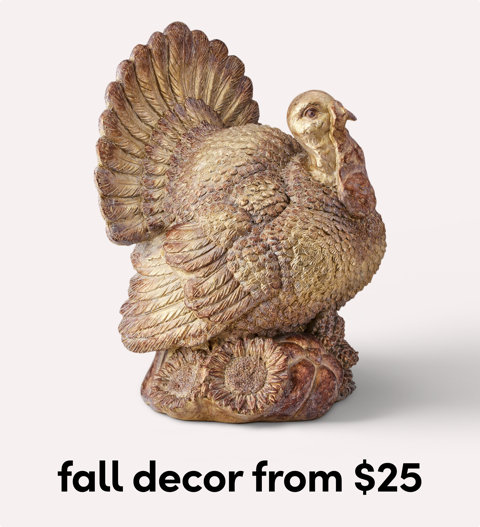 Ceramic turkey figurine fall decor.