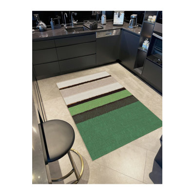 Tapis vert lavable à motif tissé vert