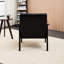 Fauteuil à dossier haut noir antique, une pièce de style moderne et médiéval idéale pour se détendre, lire et se divertir dans la chambre.
