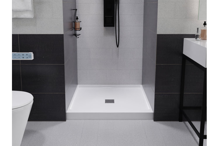 rectangular shower pan in a black and white modern bathroom